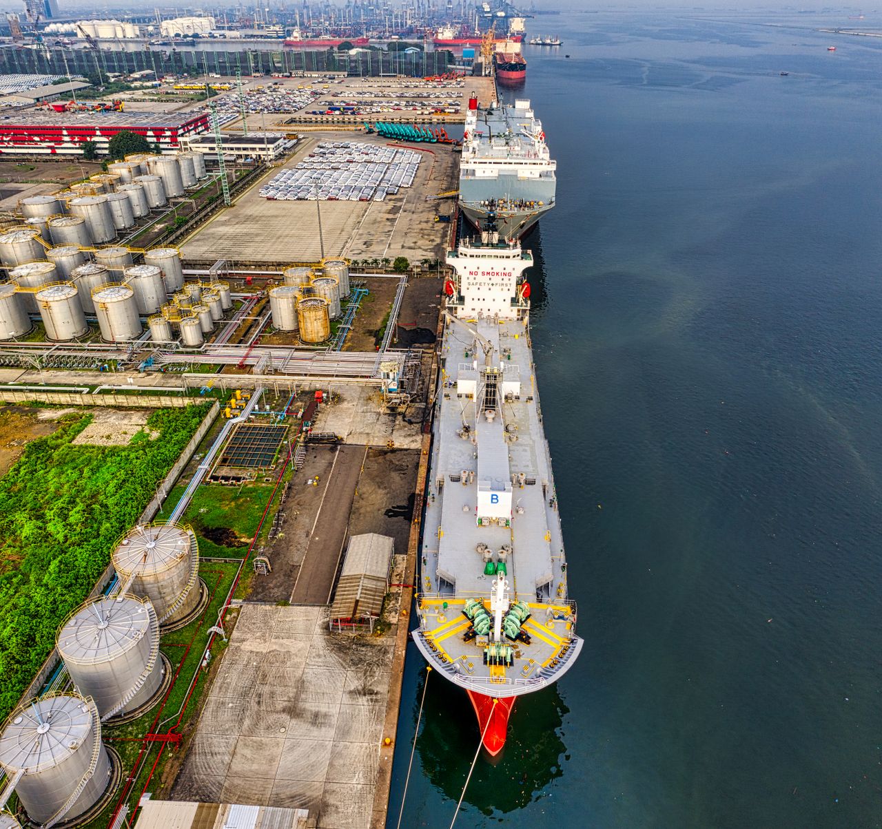 Offerings Aerial shot of oil tankers and storage facility in North Jakarta, Indonesia.